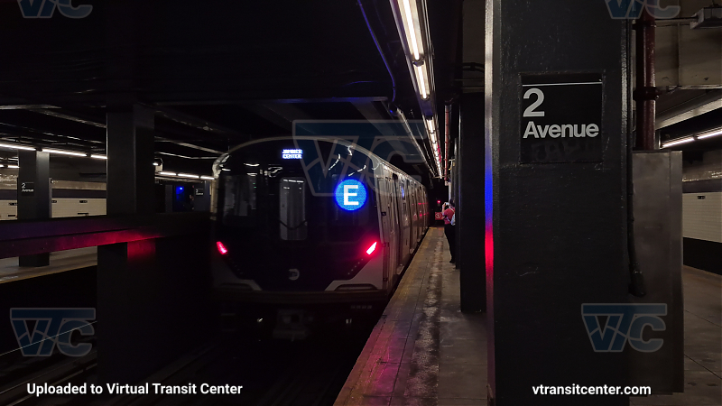 R211 E train departs 2 Av. 
A Jamaica-bound E train departs 2 Avenue. Due to track maintenance, E trains were rerouted on the F line from West 4th Street-Washington Square to 2nd Avenue. This R211 was used for CBTC testing along the IND Queens Boulevard line.
