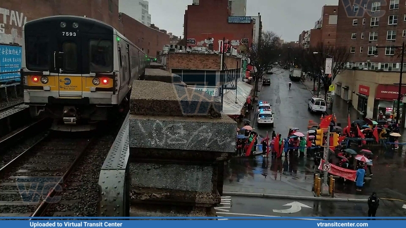LIRR M7 at Flushing Main St
an LIRR M7 heading to Port Washington at Flushing Main Street, at the bottom you can see a Chinese New Year parade being held
