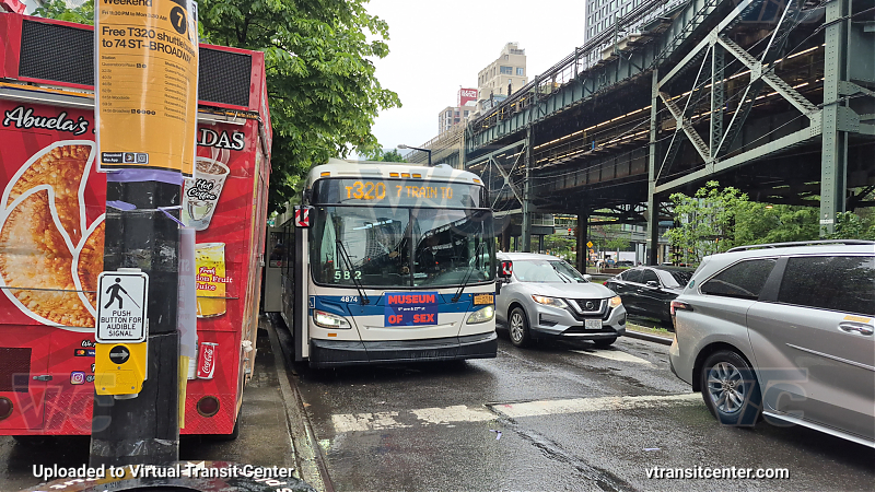 MTA New York City 4874 on the T320 7 shuttle 
2011 NFI XD40 #4874 on the T320 7 shuttle 
