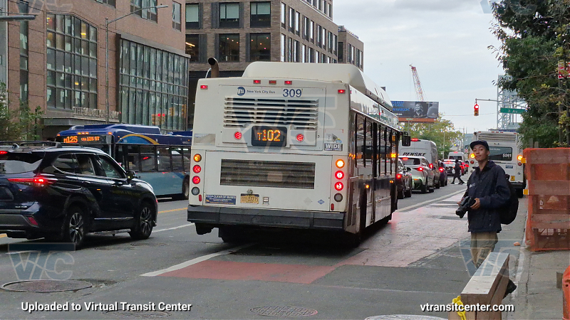 New York City Transit #309 on the T102 6 shuttle
New York City Transit #309 on the T102 6 shuttle
