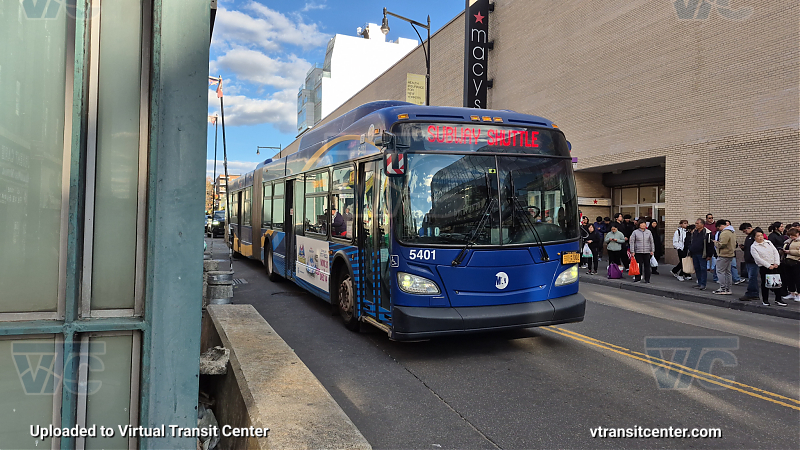 MTA New York City 5401 on the T321 7 shuttle 
2015 NFI XD60 #5401 on the T321 7 shuttle 
