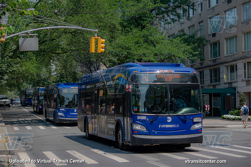 NYCT MTA 2021 New Flyer XDE40 #9486
Heading southbound on 5th Avenue, leading a line at 80th Street
