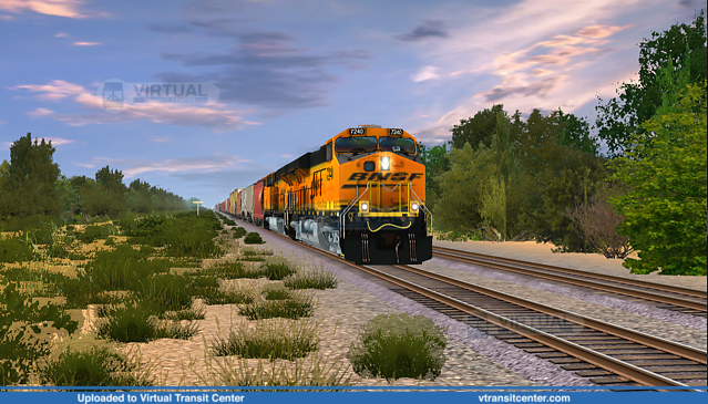 BNSF ES44DC takes a mixed freight train on a sunny day
