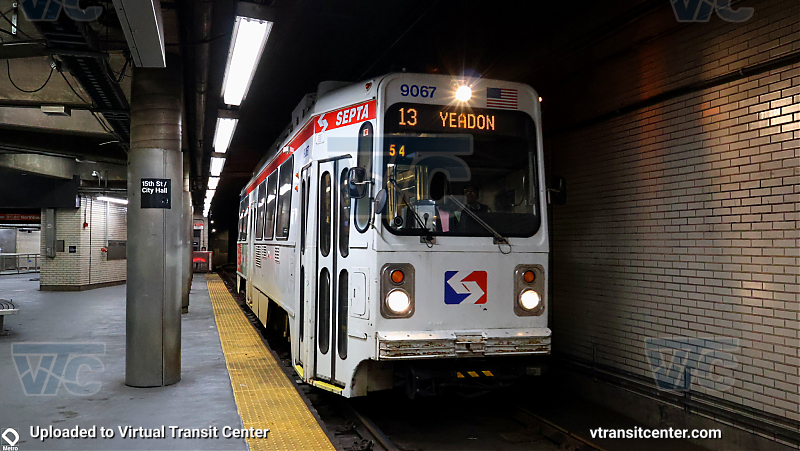 SEPTA 9000 Series Trolley Car on Westbound T3 at City Hal
Car 9067 still displaying 13 pulls into 15th St Westbound Platform. 
