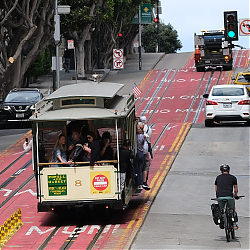 MUNI_8_and_cyclist_-_Powell_-_9-25-23_-_1X1.jpg