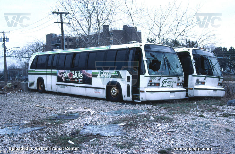 Green Lines 1005 & 1015
Green Lines 1005 and 1015 both at the former Green Lines Far Rockaway yard awaiting scrap in April 2006. 
Keywords: green lines;gmc;rts;rts03;scrap